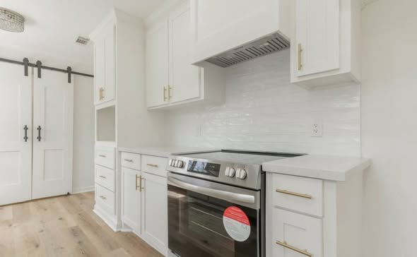 Kitchen flooring and cabinet detail by AVS Flooring