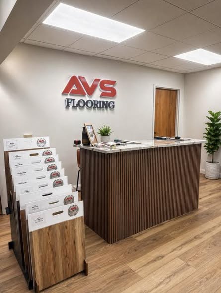 AVS Flooring showroom front counter and product samples